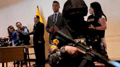 Christian Zurita, second from left, who replaces slain presidential candidate Fernando Villavencencio, gives a press conference in Guayaquil, Ecuador