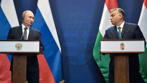 Vladimir Putin and Viktor Orban at lecturns