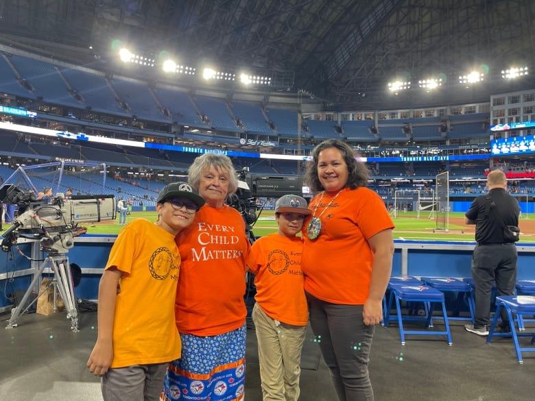 Dolores Naponse, second from left, with daughter Paula and her grandkids at Blue Jays game