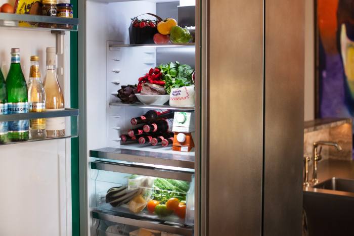 Rosé, sparkling water and ingredients for pasta all’arrabbiata in his fridge