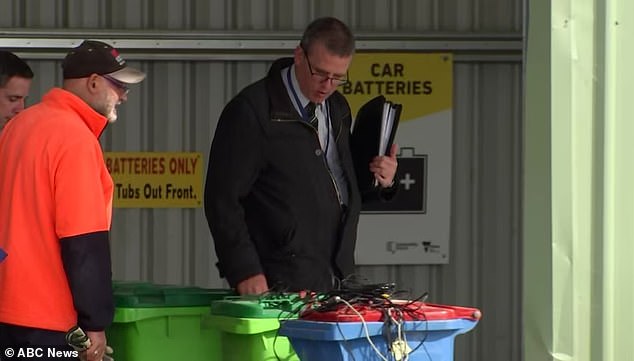 Police officer at the tip where the mushroom or vegetable dehydrator was allegedly dumped by Erin Patterson when she panicked after the deaths of her husband's relatives