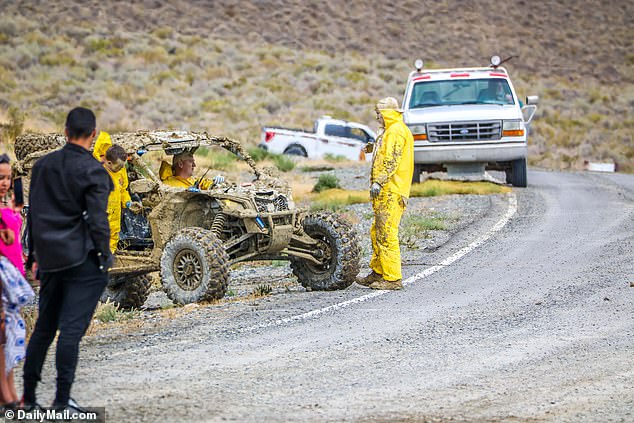 Some people were able to get around the site in ATVs equipped to traverse the muddy landscape