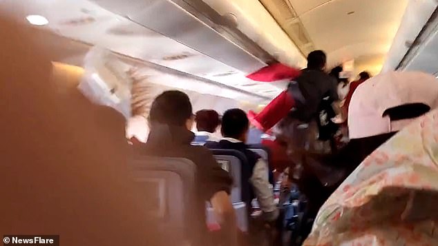 Video captured the moment people were thrown from their seats as the violent turbulence hit