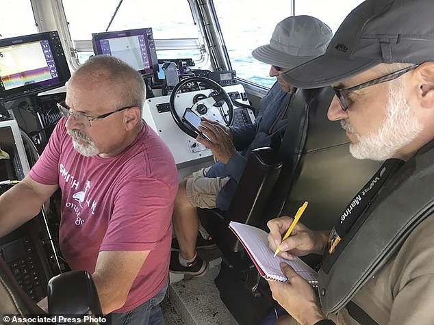 The ship was found by shipwreck hunters Brendon Baillod and Bob Jaeck, seen here surveying the Trinidad off the coast of Algoma They found the 156-year-old ship in July at a depth of about 270 feet