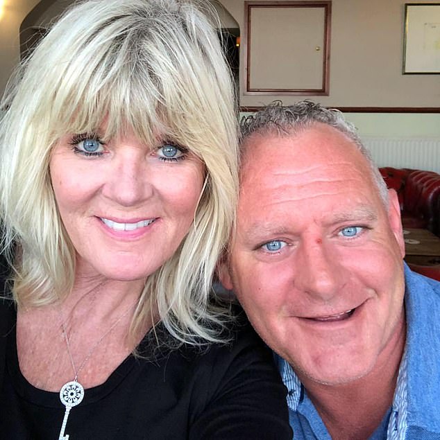 Natalie Ryan-Fraser, 55, a professor of English at Angelo State University in Texas, pictured with her Scottish-born husband Wayne Fraser. After her death, the university renamed its English and Modern Languages department in her honour