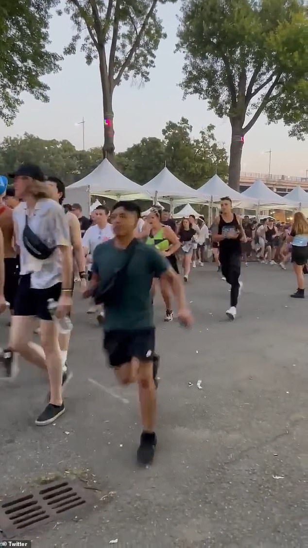 The video from the security gate shows what appears to be hundreds of people rushing the gate of the event which is held on Randall's Island