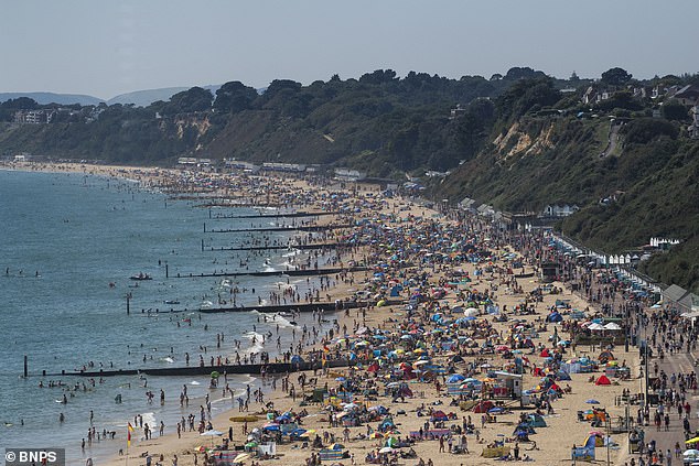 Meanwhile, the beach and esplande were packed yesterday afternoon in Bournemouth, Dorset, as the UK enjoys a September heatwave