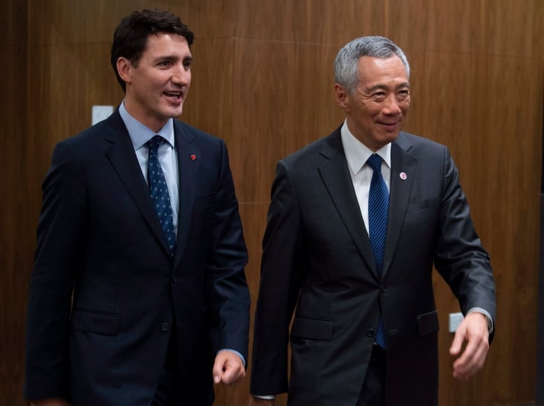 Canadian Prime Minister Justin Trudeau arrives for a signing ceremony with Singapore Prime Minister Lee Hsien Loong in Singapore, Wednesday November 14, 2018.