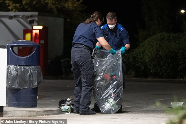 Crime scene investigators from Greater Manchester Police were seeing poring over the scene of the incident