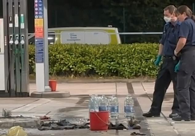 Police on scene after the incident on Monday at a petrol station