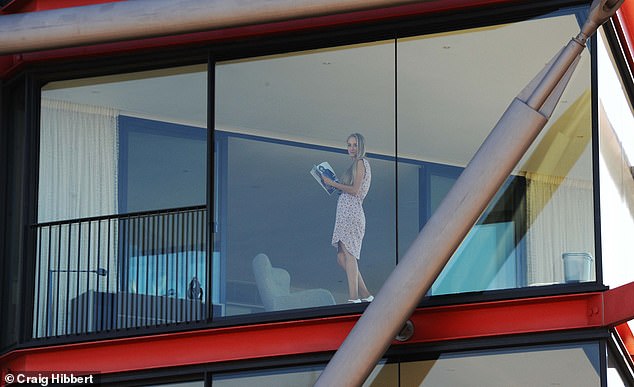 A photograph taken from the viewing platform in 2016 shows how visitors could see into the apartments at Neo Bankside. Pictured: A Mail on Sunday reporter in one of the flats, seen from the viewing platform