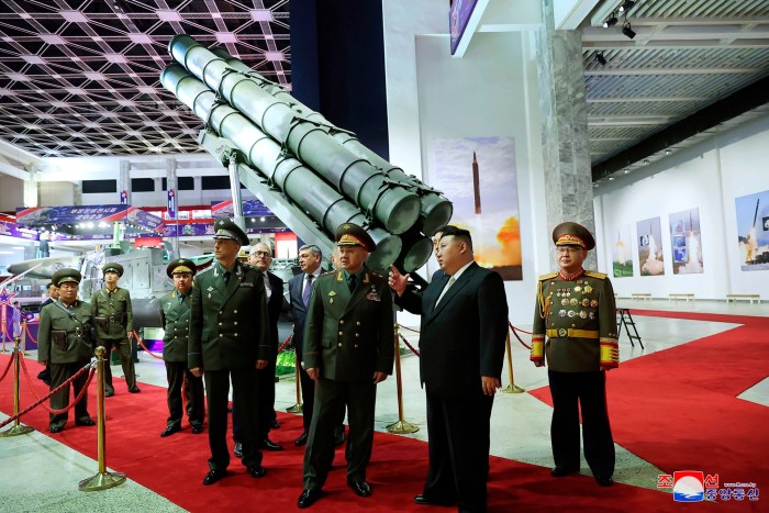 North Korean leader Kim Jong Un, second from right, and Russian defence minister Sergei Shoigu, third from right, visit an arms exhibition in Pyongyang in July