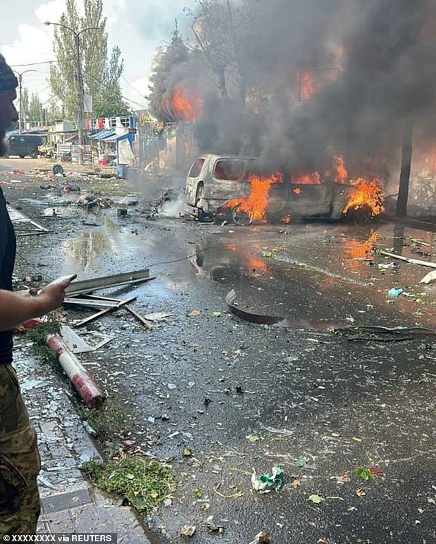 View of a vehicle on fire following an attack on the city of Kostiantynivka in eastern Ukraine, September 6, 2023