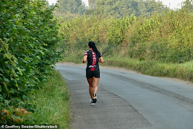 People go out exercising early in the cool morning's air at Dunsden in Oxfordshire today