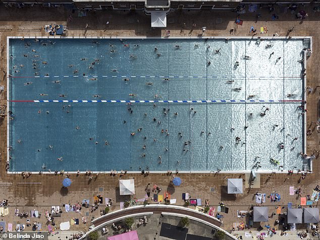 Londoners headed to Parliament Hill Lido, which was packed full of swimmers looking to dive under the heatwave