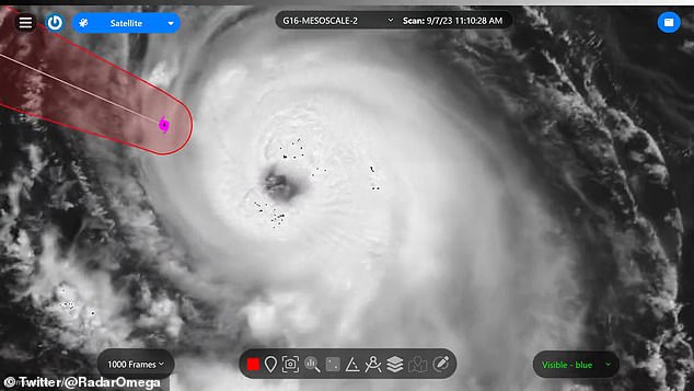 Hurricane Lee is pictured swirling over the Caribbean on Thursday - the first Category 5 storm of the season