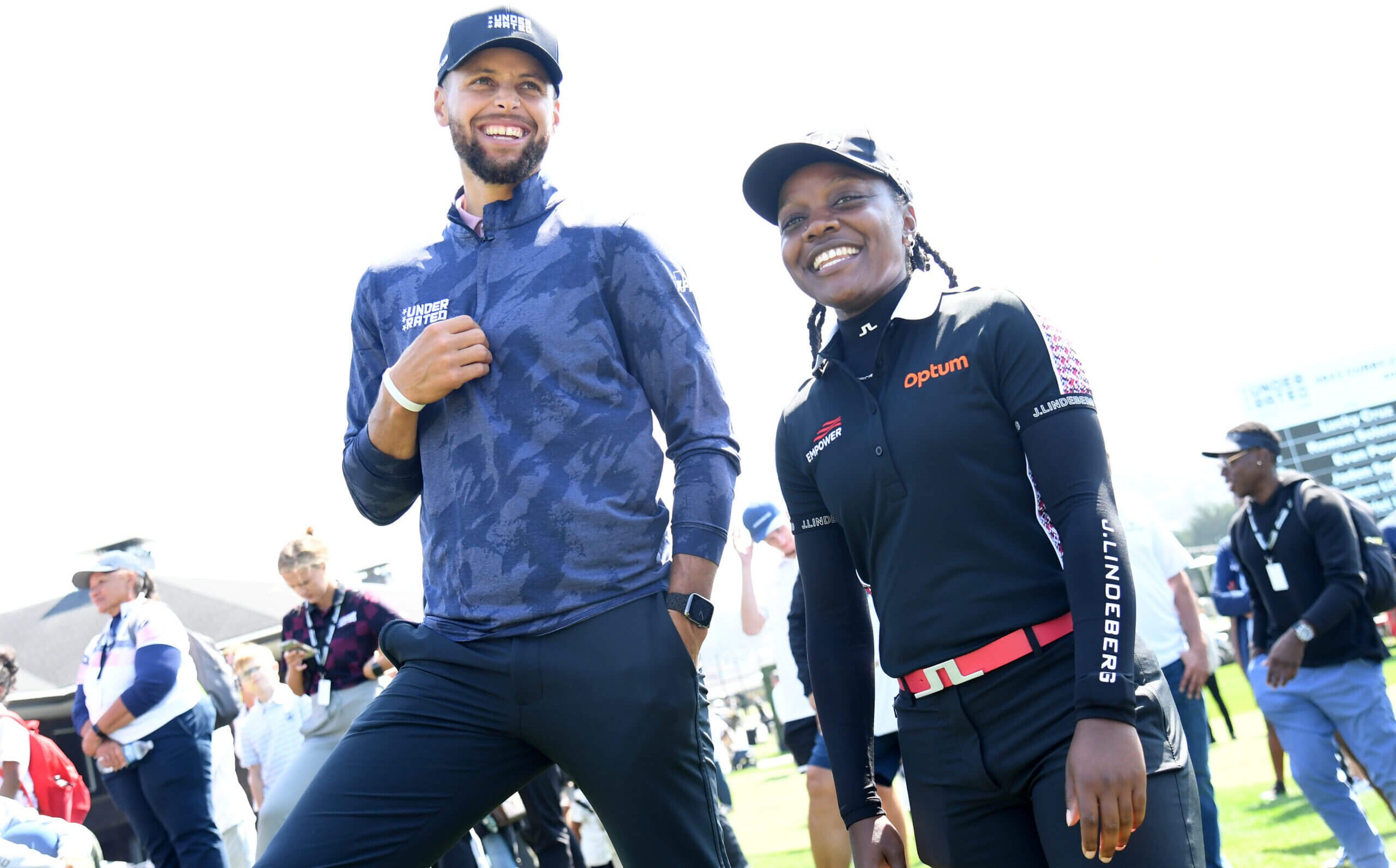 Steph Curry and Mariah Stackhouse take in the action at the Underrated Tour.