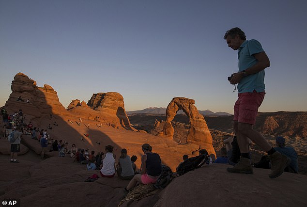 This move could costs tens of thousands of dollars a day but it is seen as a bargain due to the amount of money tourism generates in the area. Pictured: Arches in Arizona