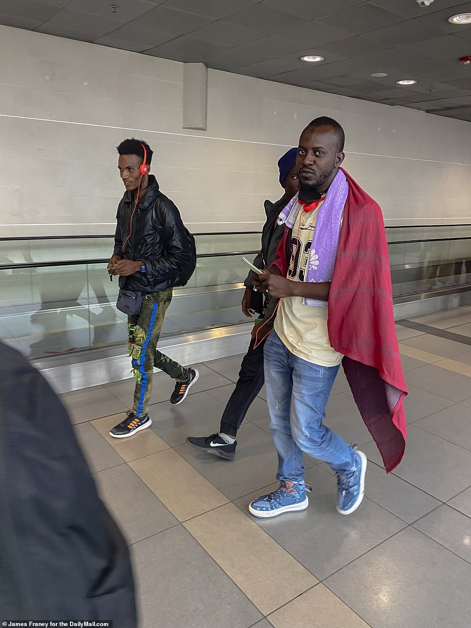 At last it's over. Weary travelers get off the plane in Bogota. Now they have to steel themselves for the rest of the journey to the United States