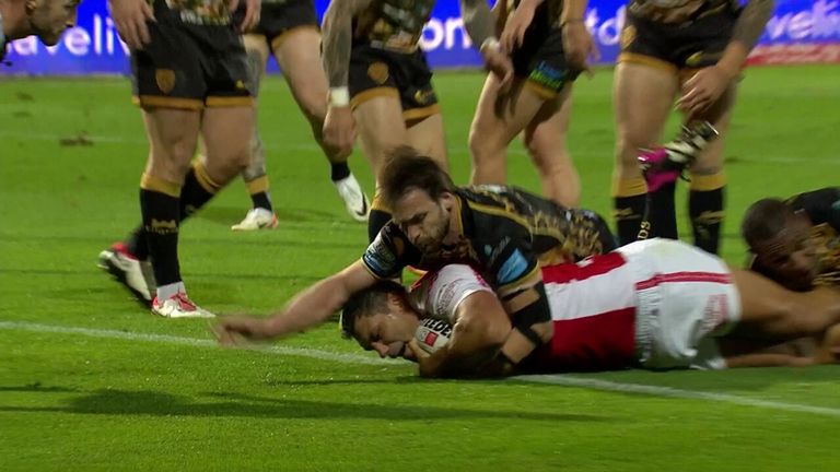 Ryan Hall goes over and does ground the ball after the video ref check to extend Hull KR's lead against Leigh Leopards.