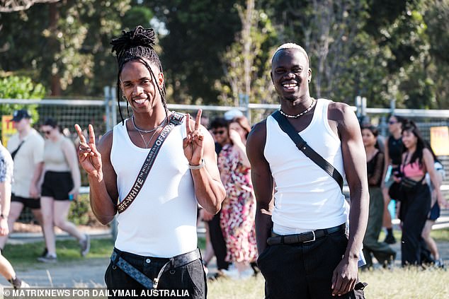 Simple white singlets were a staple for many revellers in the crowd