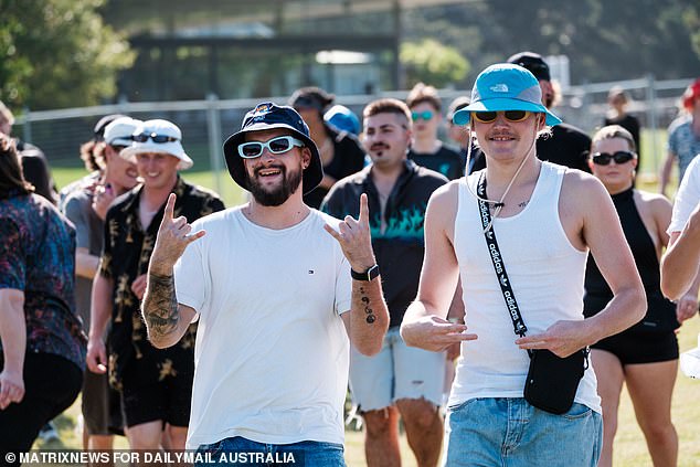 Hats were a must for partiers planning to endure the clear blue skies and blazing sunshine