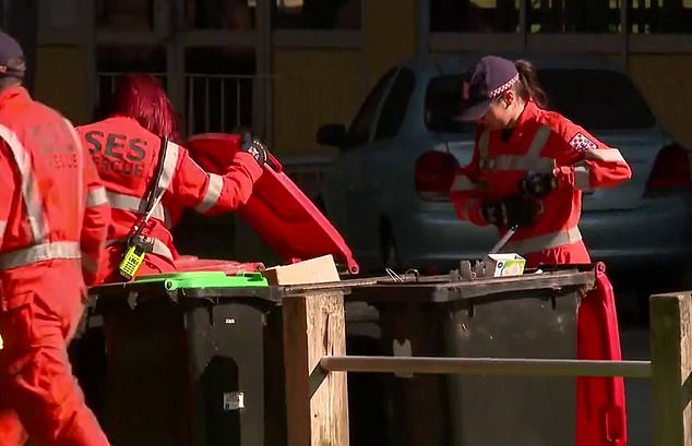 Forensic investigators and SES crews scoured the public housing block for clues on Saturday