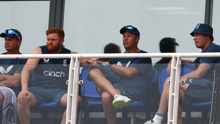 He was sat on the team balcony to watch the match with the England squad and coaches 