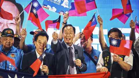 Terry Gou waves a flag