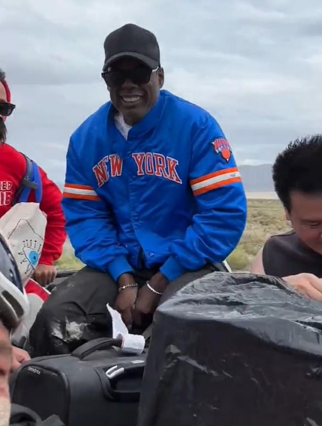 Chris Rock escapes Burning Man festival after it was shuttered due to torrential rain – leaving behind 73,000 revelers to face freezing weather in Nevada desert