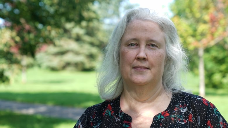 Amanda Young, a mother from Ottawa's Barrhaven neighbourhood, stands in a local park.