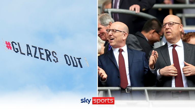 Manchester United fans from the Pittsburgh & Tampa supporters groups fly a &#39;Glazers Out&#39; banner above the Tampa Bay Buccaneers stadium, which the Glazers own, ahead of the Buccaneers NFL match against the Eagles.