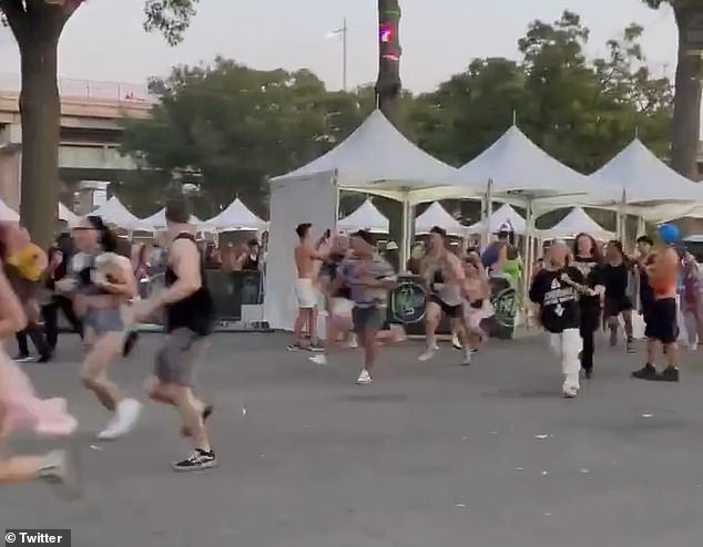 Moment crowd of Electric Zoo revelers storm the gates after organizers said it was full and ticket holders would be turned away – as concertgoers brand event the ‘worse experience of my life’