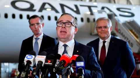 Qantas chief executive Alan Joyce speaks to media at Sydney airport