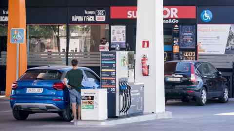 Several cars at a gas station in Mostoles, Spain