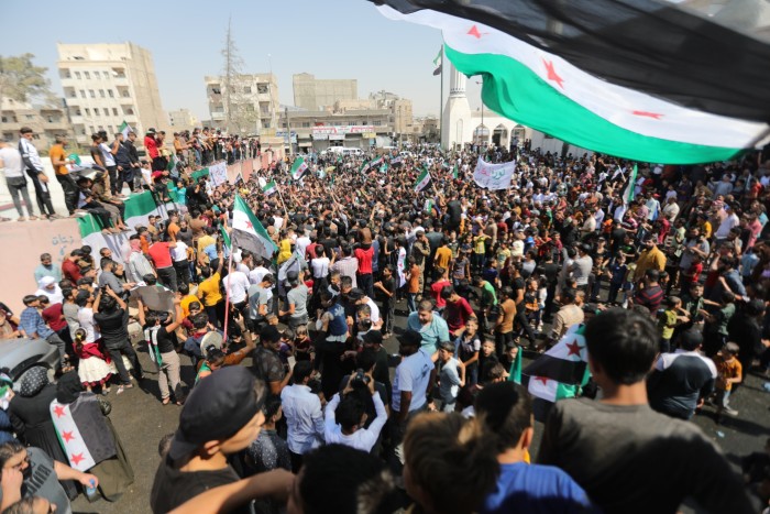 Demonstrators in Aleppo last month