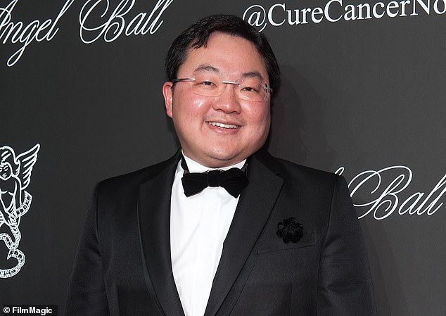 The playboy friend to the stars who lavished A-listers with gifts ‘paid for millions he embezzled’: How Jho Low rubbed shoulders with showbiz elite, ‘dated’ Miranda Kerr…and is now a fugitive from justice