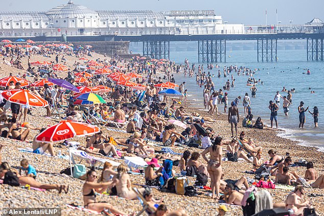 Today is the hottest day of the year, Met Office says – as Britain sweats in scorching 32C heatwave, with high temperatures set to last all week