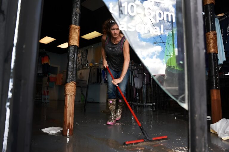 Drenched but alive, Floridians survey hurricane damage