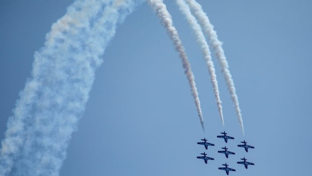 Loops, rolls and barrel turns: Air show pilots display their signature manoeuvres