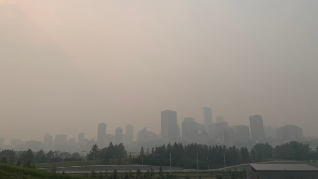 As haze lingers, Edmonton and Calgary break records for summer smoke