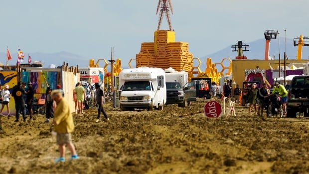 Burning Man festival exodus set to begin with muddy desert drying