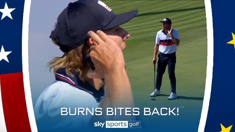 Team USA's Sam Burns sinks the putt to win the sixth hole before gesturing to the Ryder Cup crowd.