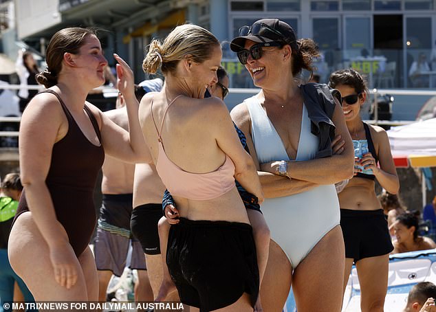 Friends gathered at the beach to relax amidst the blistering heatwave that scorched the city over the weekend