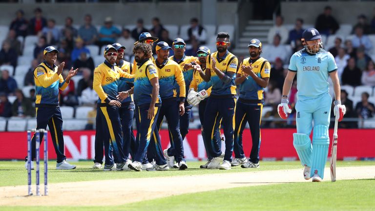 Sri Lanka&#39;s Lasith Malinga celebrates with teammates after the dismissal of England&#39;s Jonny Bairstow during the Cricket World Cup match between England and Sri Lanka in 2019