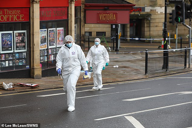 Forensic investigators have been seen searching the road and pavements within a police cordon at the scene, while a large police presence was seen around the town