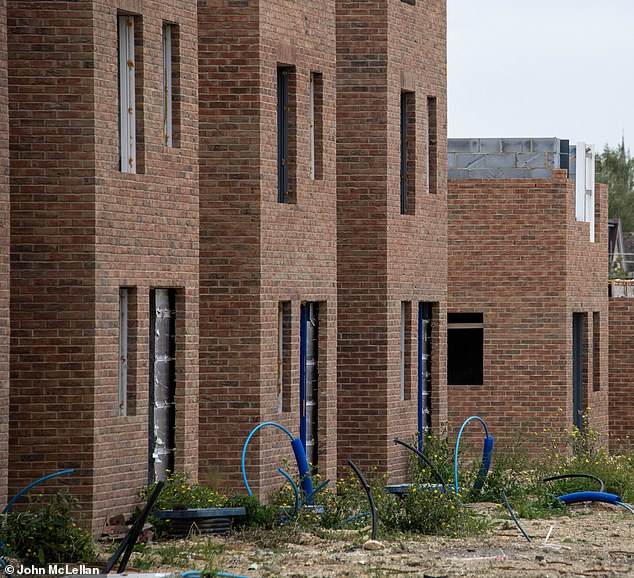 The newly built homes standing in rows will be destroyed in an operation expected to last three months before work starts to build them back up again brick by brick