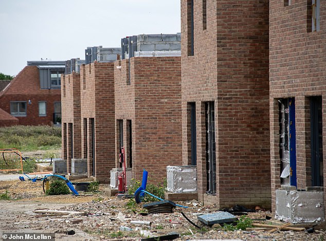 Military-style concrete blocks have been put in place along with tall metal railings emblazoned with signs warning 'unauthorised persons' and children to keep out