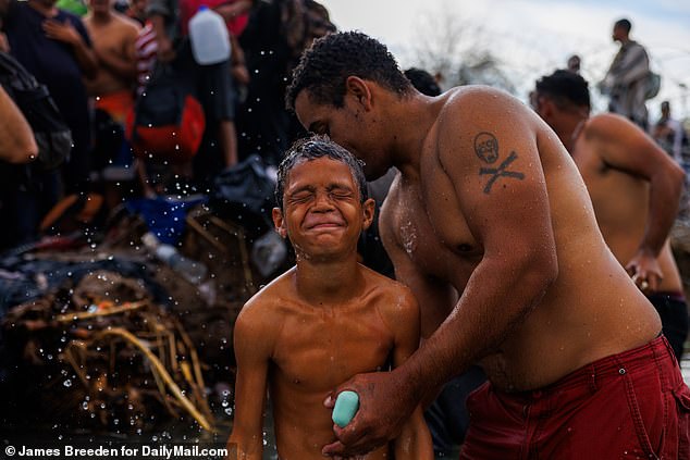 A young boy is apparently scrubbed after crossing the Rio Grande