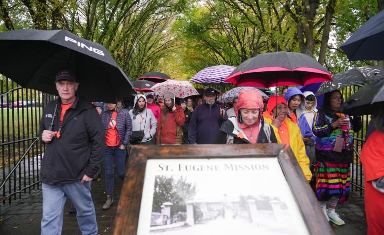 Hundreds of people attended a walk for the National Day for Truth and Reconciliation in the First Nations community of Aq'am on Saturday, Sept. 30, 2023. 